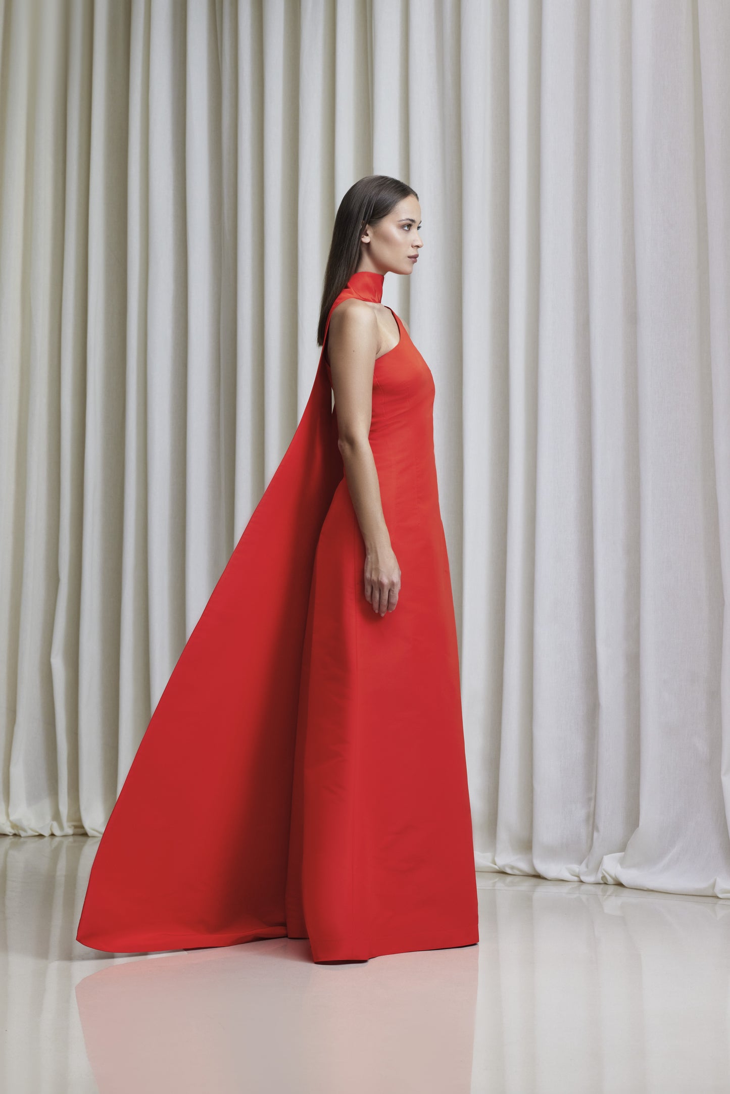 Assymetric one-shoulder with draped tie cape gown in silk-faille